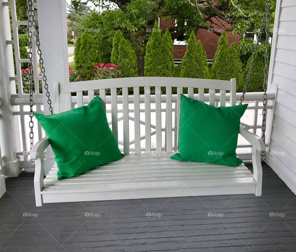 Kelly Green Pillows on Porch Swing