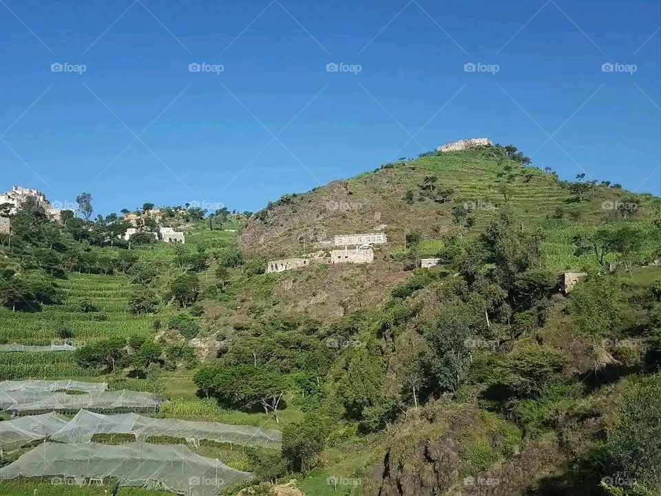 Glory be to God, the magnificent and picturesque view and the natural green trees are a view that is nothing more wonderful than it