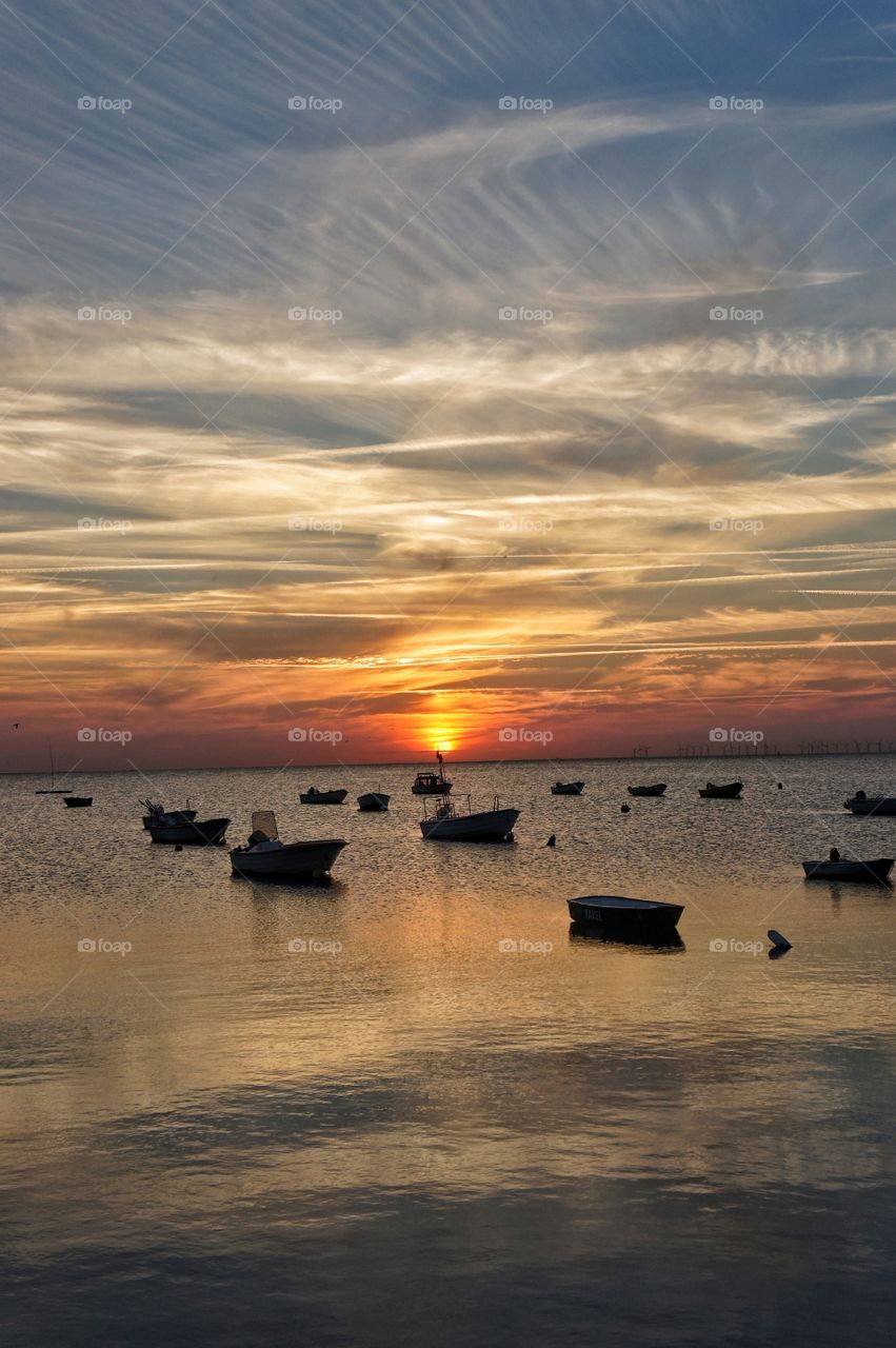 Boats in sunset 