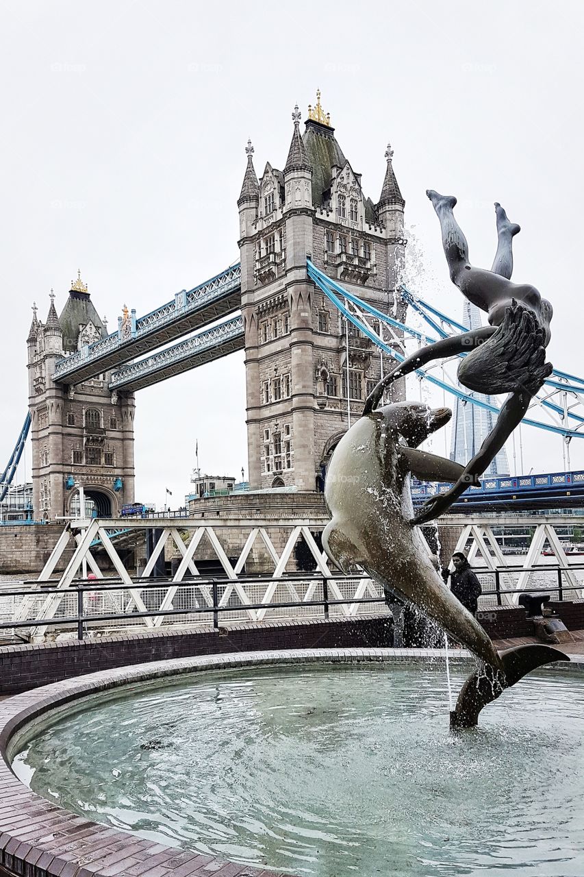 Fountain view on tower Bridge of London