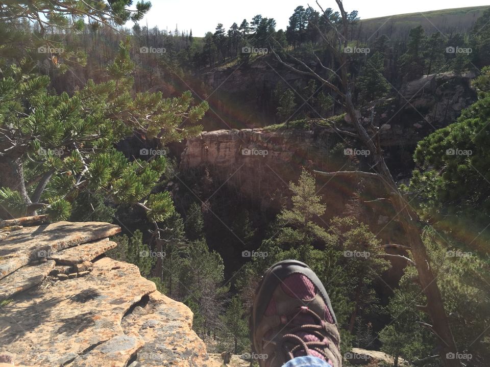 Sitting on the Edge. Sitting on the edge of a Wyoming mountain canyon