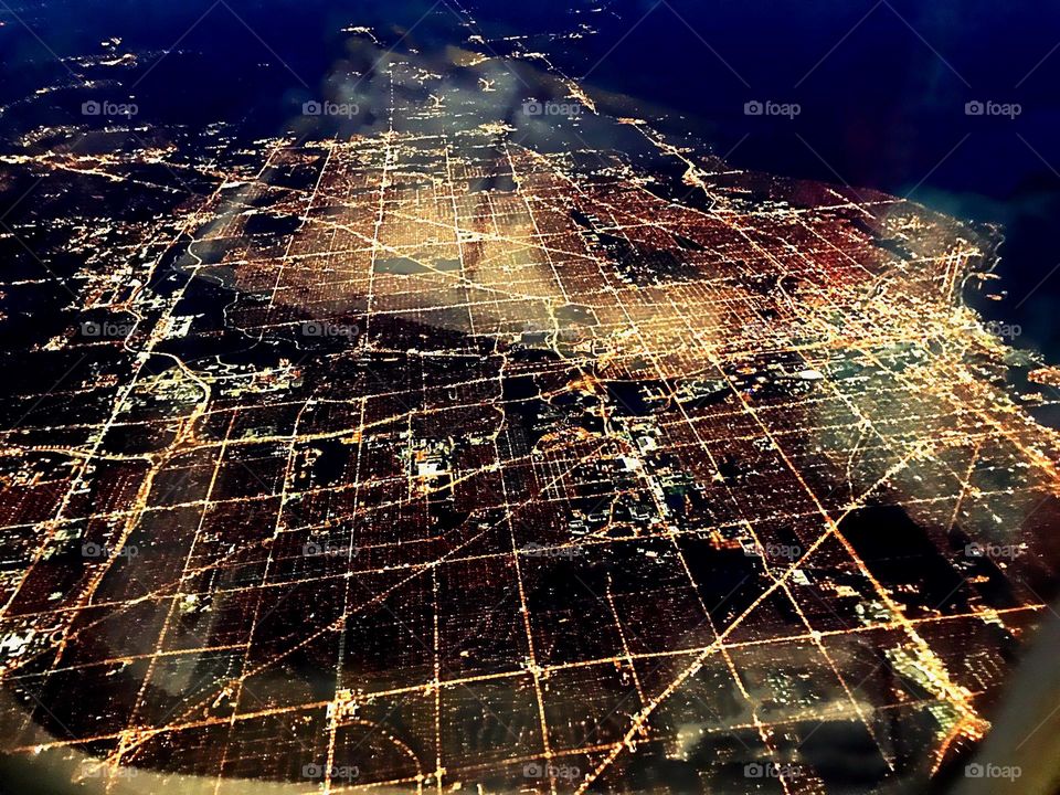 Nighttime view from the window of a jet.