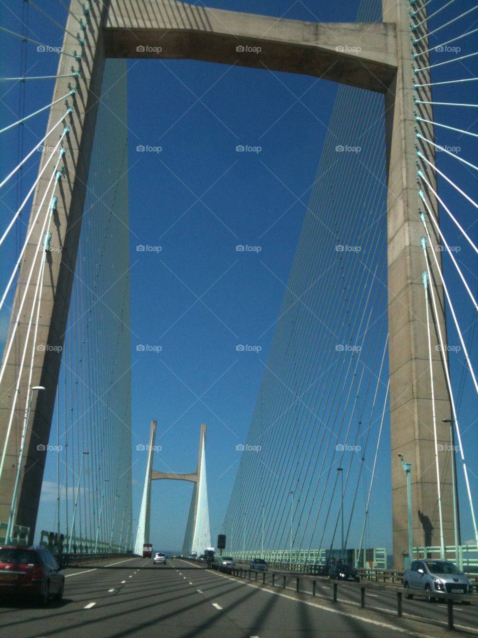 Crossing the Severn bridge with amazing blue sky. Don’t look up, driving into Wales. 