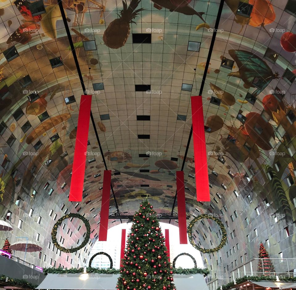 Indoors Christmas tree and decoration in a public market