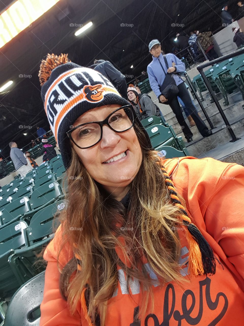 selfie at Orioles game. beanie hat giveaway night