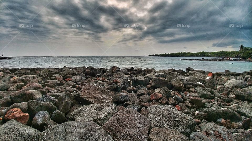 Rocky beach, impending storm
