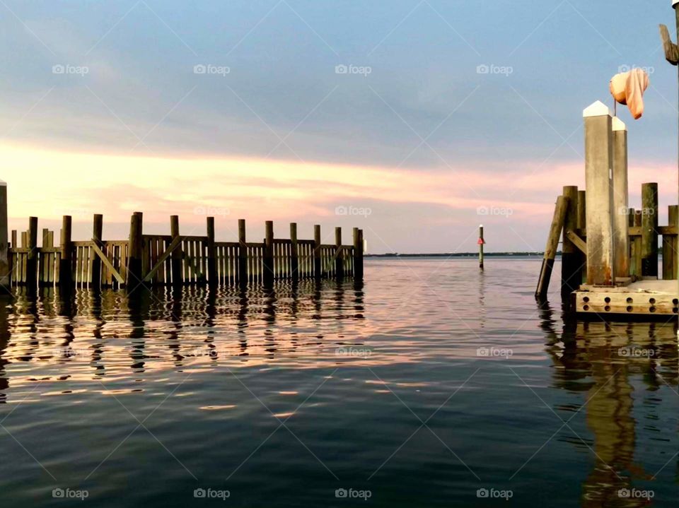 sunset off of a dock in florida