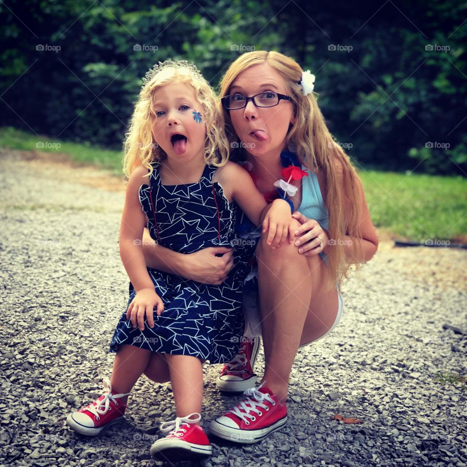 Mother and Daughter being silly on the 4th of July in the USA