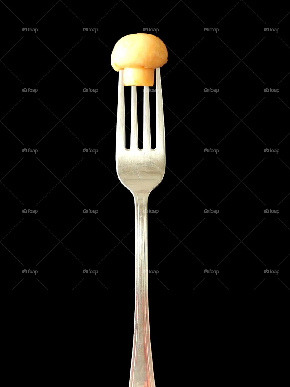 Mushroom in fork