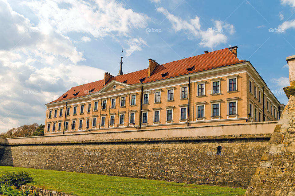 Low angle view of the Lubomirski Castle against sky.