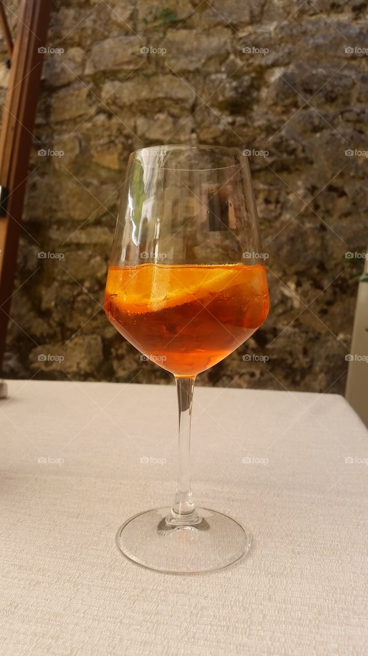 Aperol spritz on the table in volterra