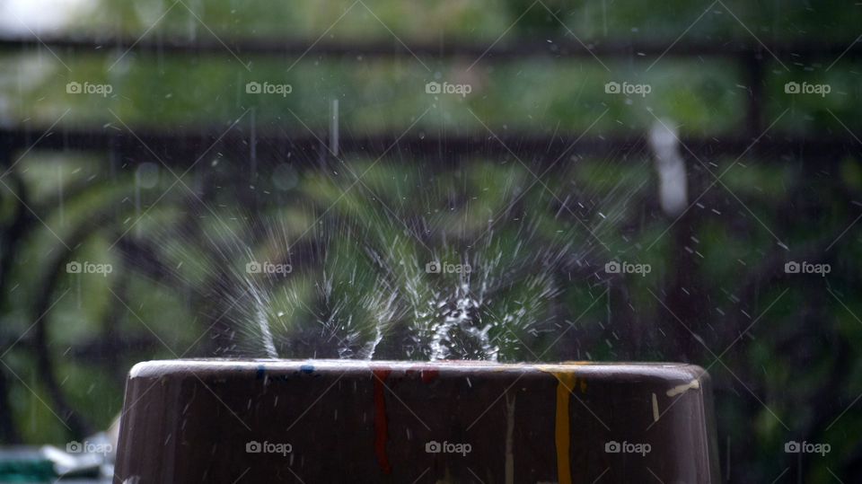 Two dancing raindrops in their dramatic climax.