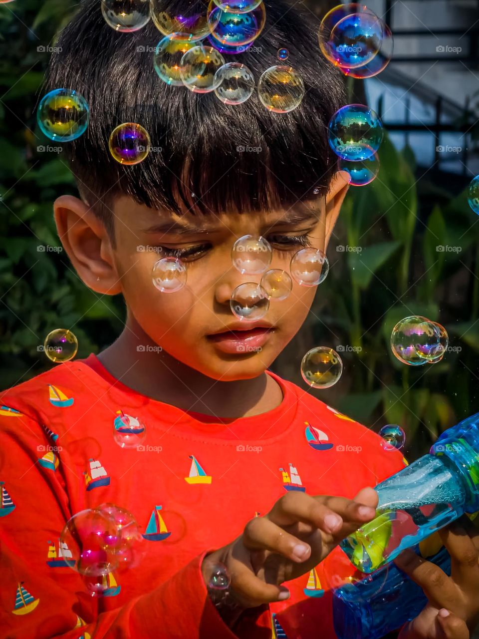 One of my best photo of people this year is this cute little boy playing with bubble gun