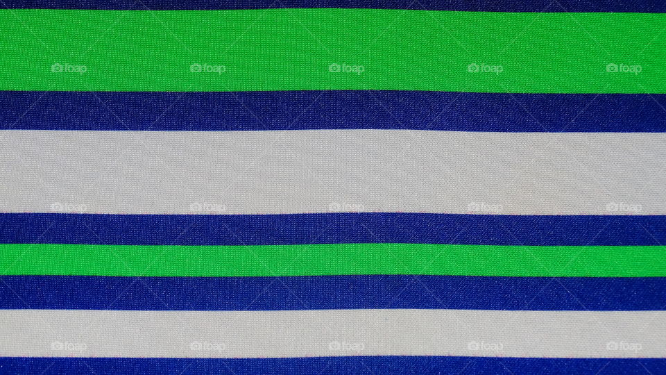 Stripes background-abstract texture. Blue, green, and white. 
