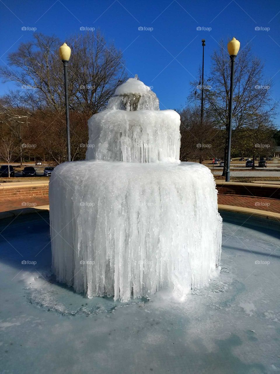 Frozen fountain with blue sky