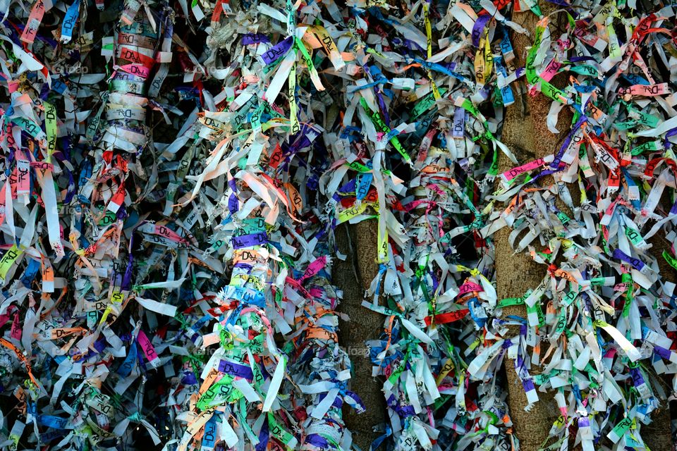 An array of colorful strips of paper tied from the wish tree at The Dali Museum in Saint Petersburg, Florida.