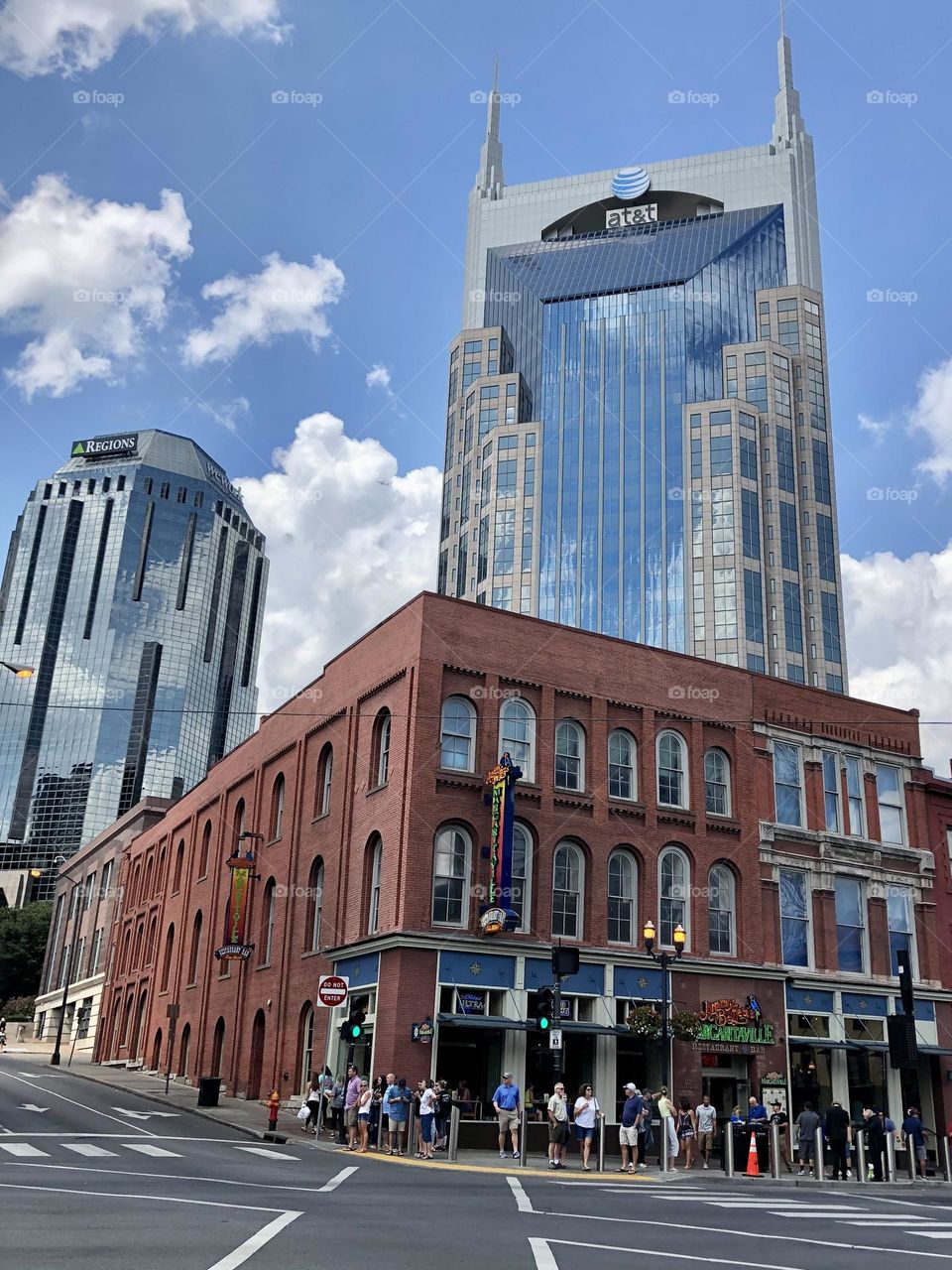 Architectural marvels nashville AT&T skyscraper batman building iconic city landmark skyline tourist mirror clouds sky sunny summer weather downtown tourists bell contruction music city Tennessee 