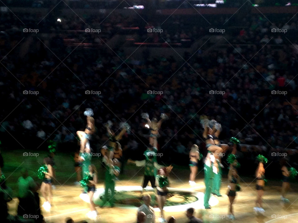 Midst performance. Spotlight on Celtics dancers 