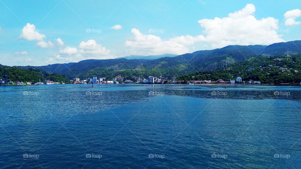 Beautiful landscape, view of Jayapura City seen from the sea, the beauty of eastern Indonesia.