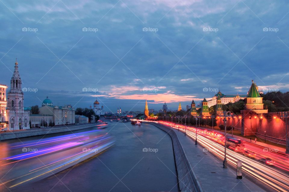 Long exposure river and embankment in the city 