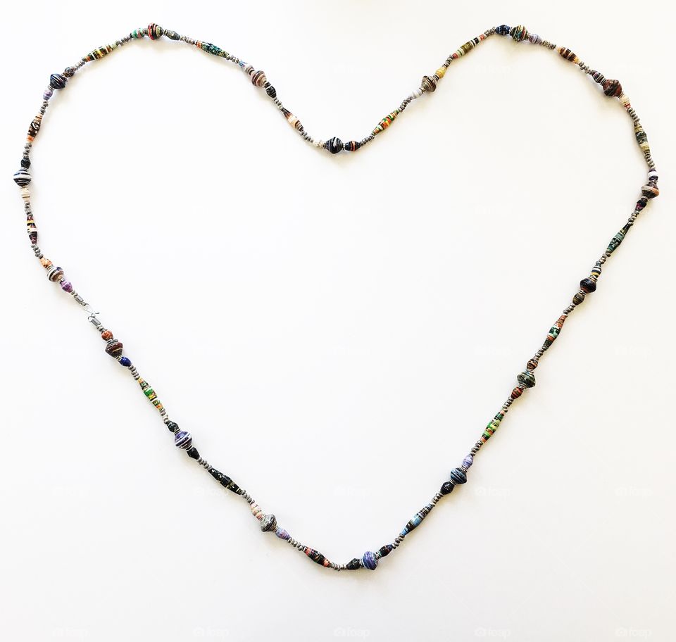 Fair trade paper bead necklace in the shape of a heart