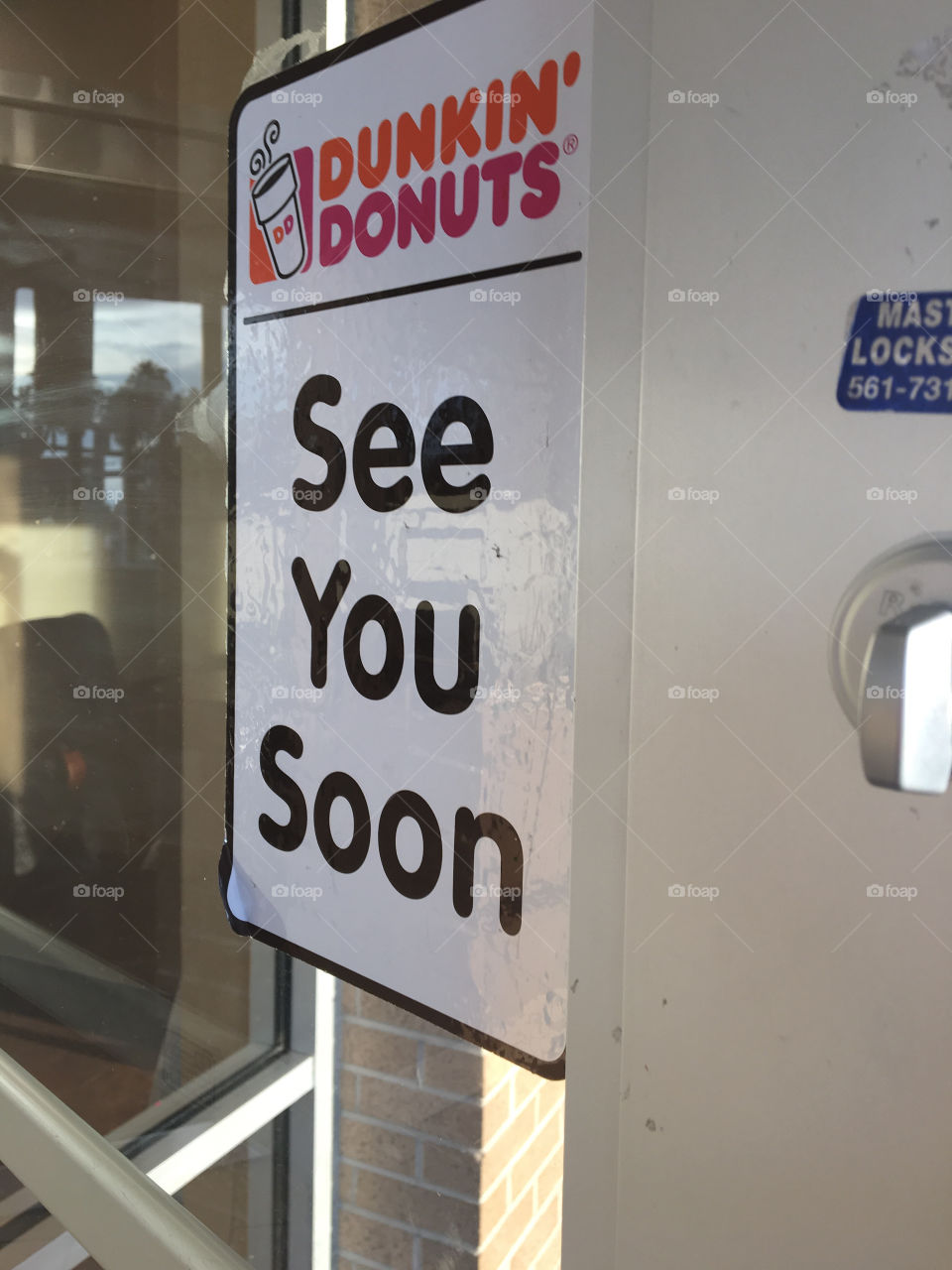 Dunking Doughnuts Door Sign 
