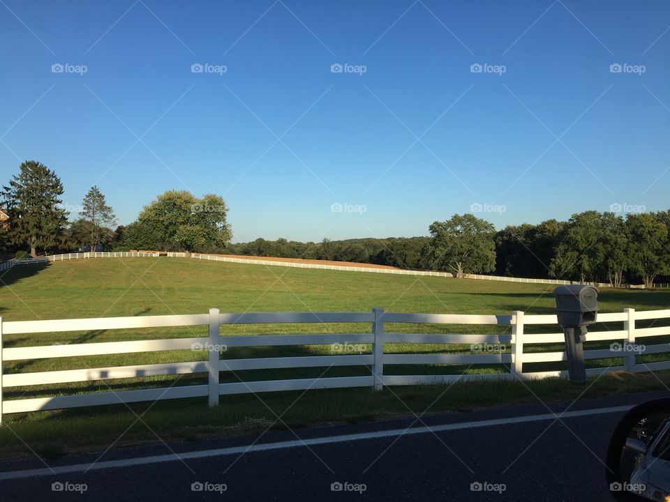 Farm with white picket fence 