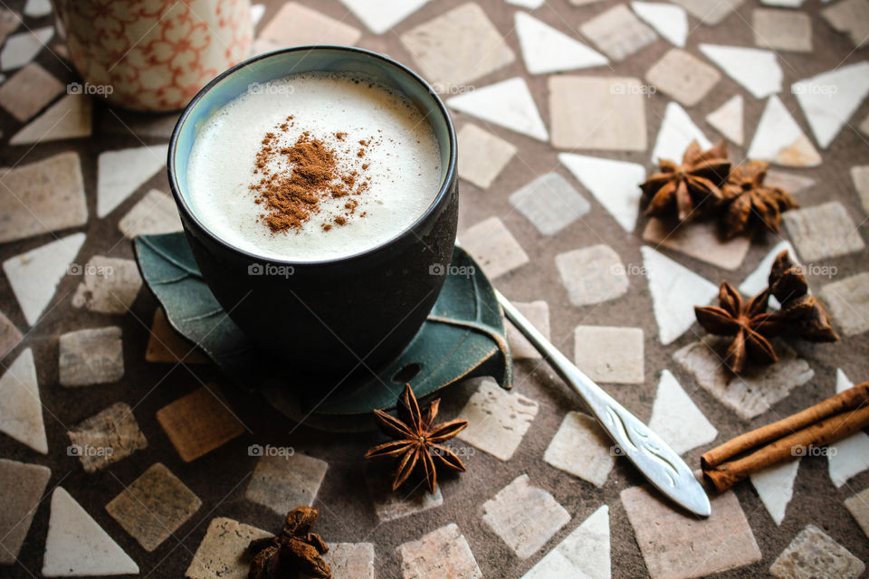 Coffee cup with cinnamon