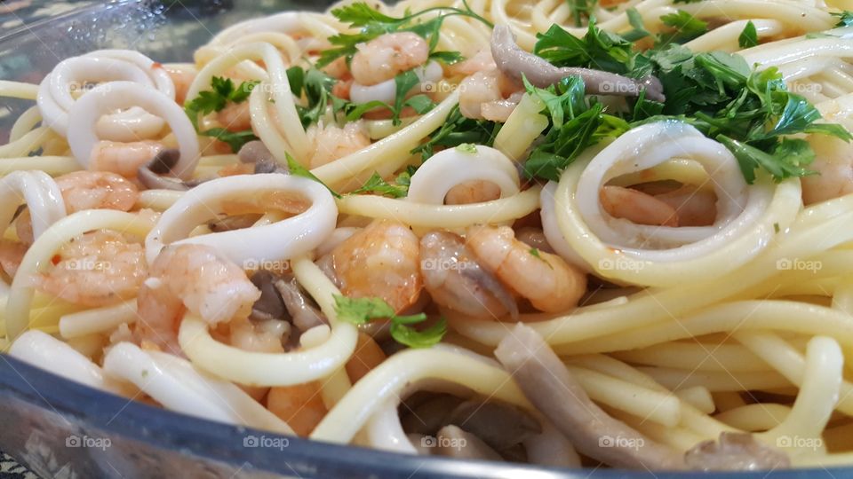 Close-up of spaghetti with prawns