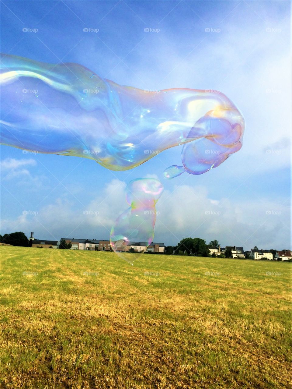 Summer sky with soap bubbles