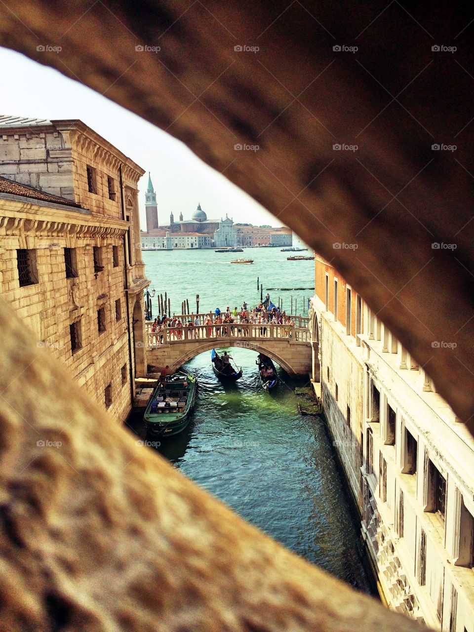 A peak of Venice, Italy . View of the canal from Venice's infamous prison.