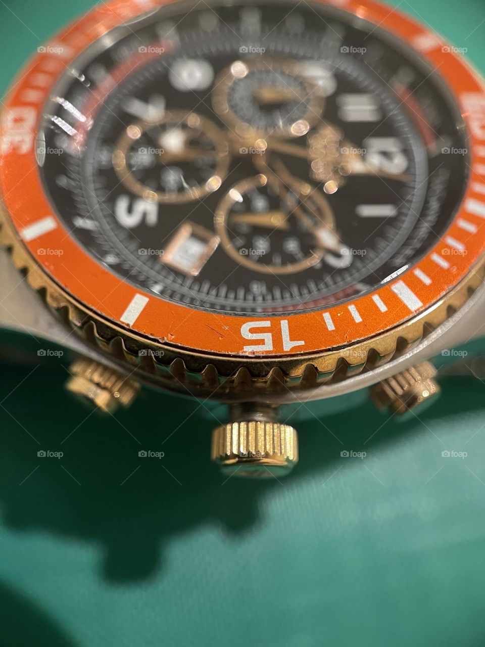 Orange hand watch 