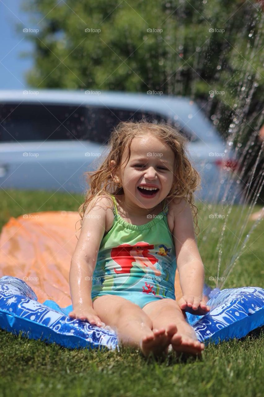 Girl playing in garden