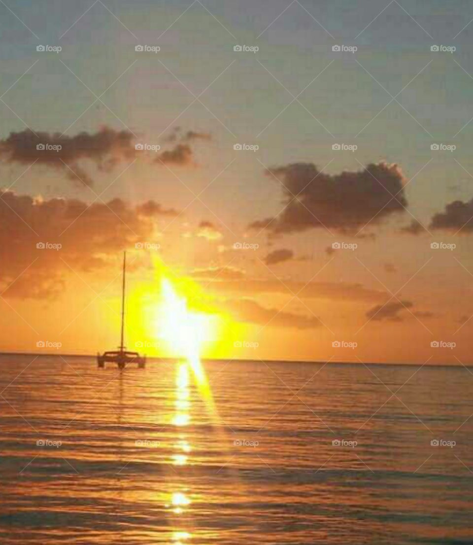 Catamaran soaking up the sunset in Negril Jamaica