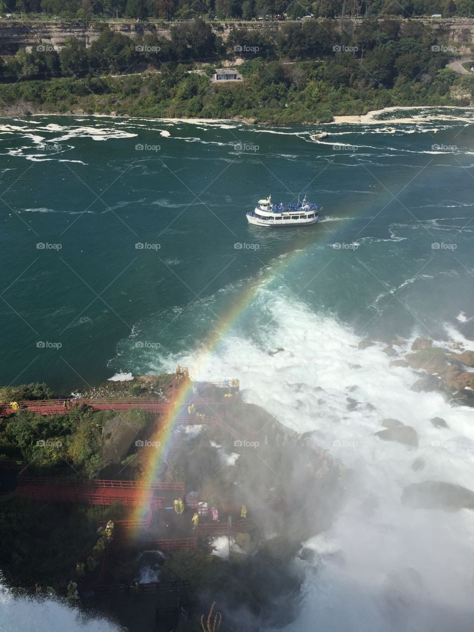 American side of Niagara Falls, Maids of the Mist going by, rainbow 