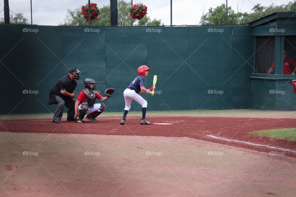 Boy playing baseball