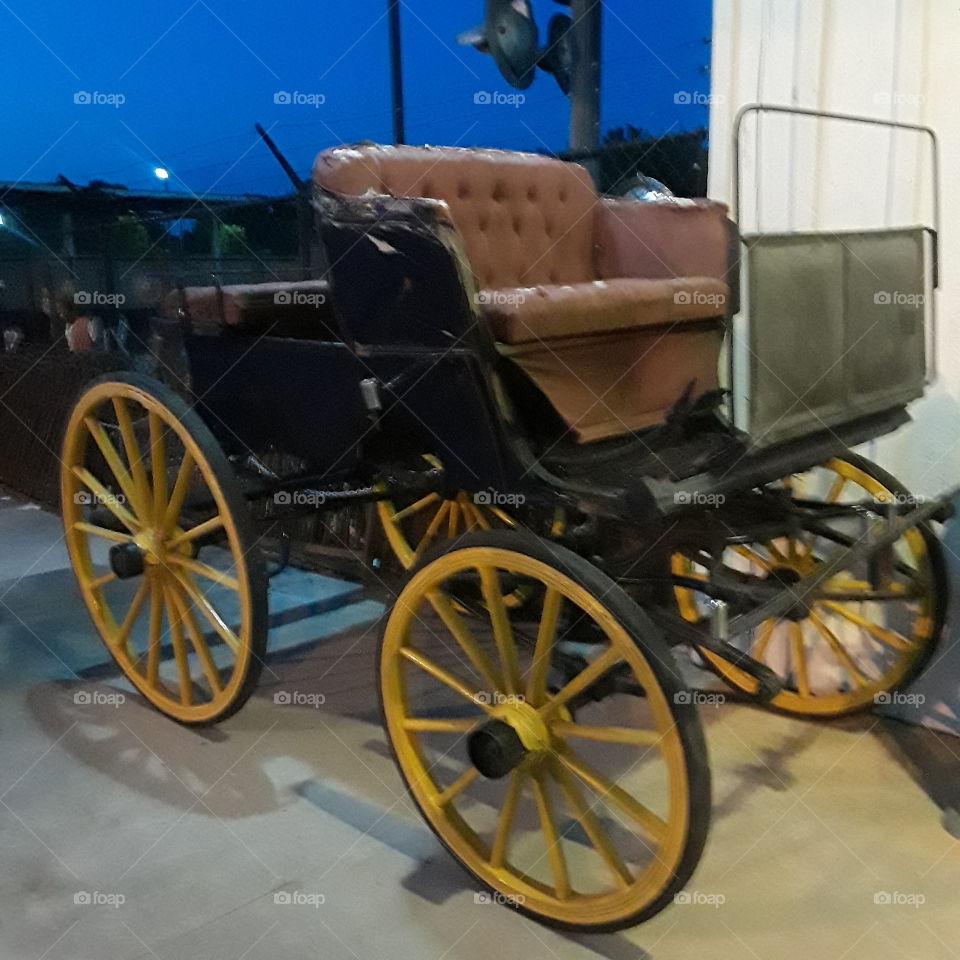 old carriage at an antique shop