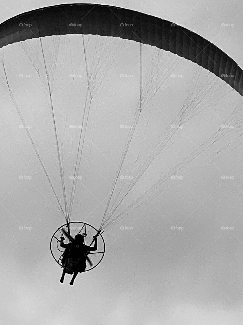 Editor’s choice. B&W of a paraglider over San Luis Pass TX l, when we were surf fishing!