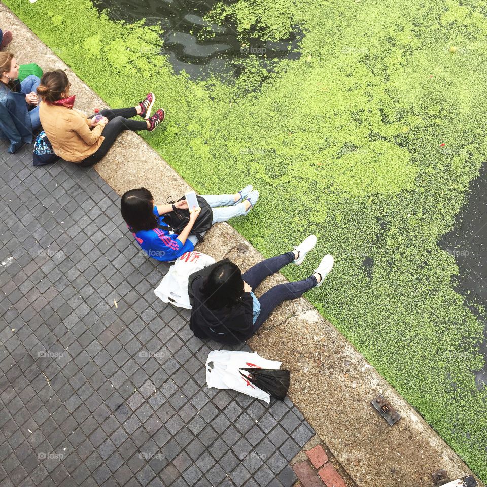 Chilling between . People chilling in Camden Town