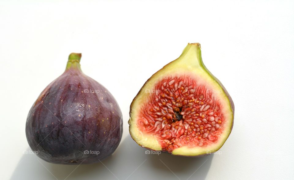 fresh figs on a white background top view healthy summer food