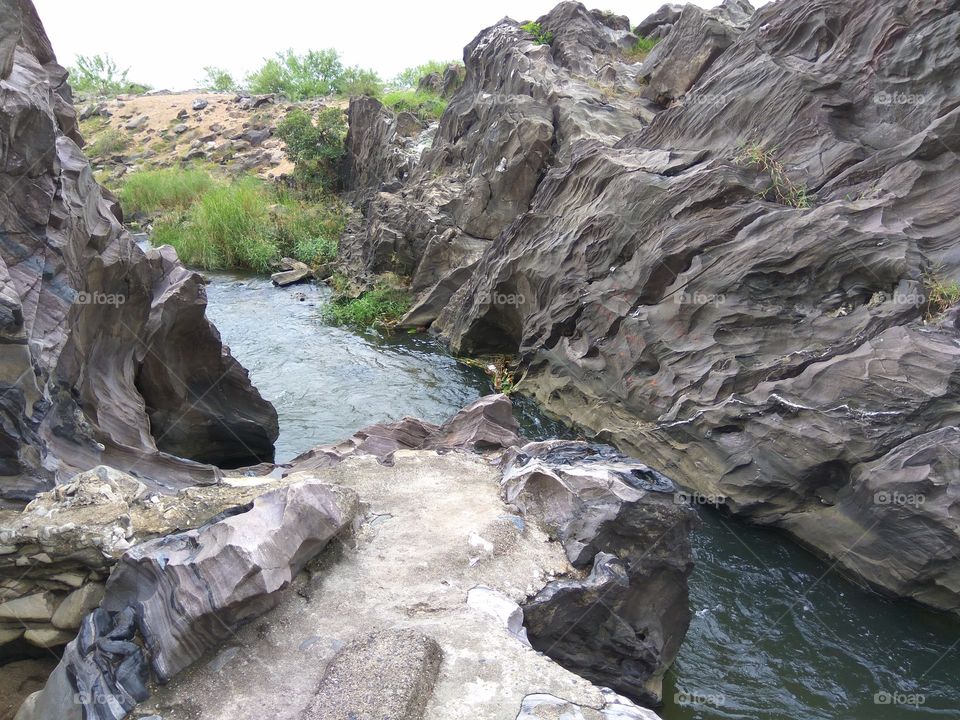 River cuts Rock
