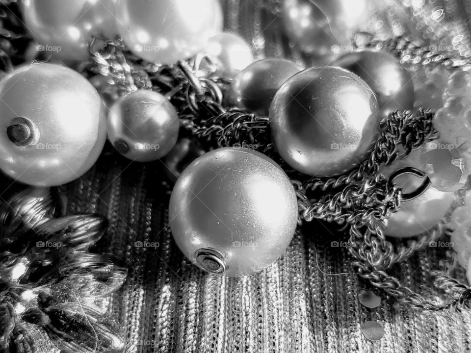 black and white photo - jewelry