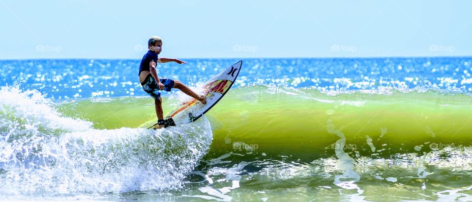 Surfer Riding Large Wave Sea Spray Hurley Surfboard Pro Rider