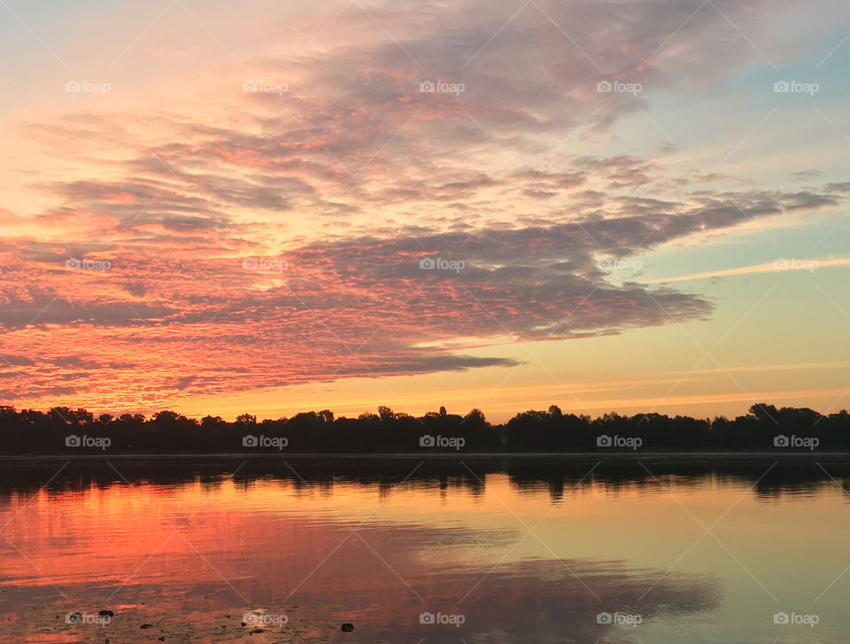 Magic sunrise in summer on the river