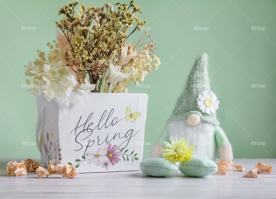Hello spring flowers & gnome on mint green background 