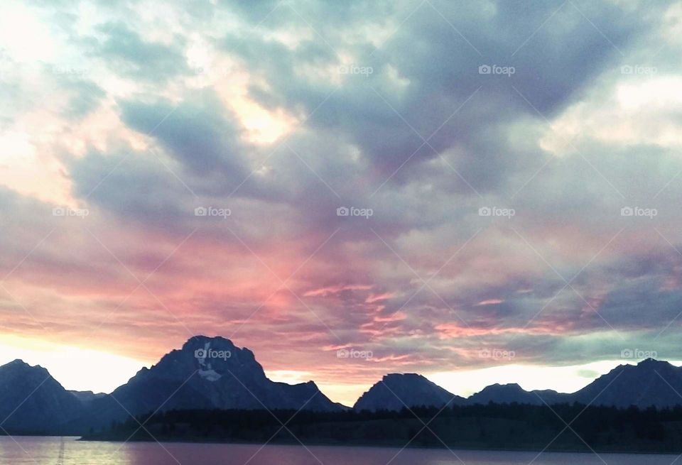 Amazing fiery sunset sky at Signal Mountain Lodge in Grand Teton National Park Wyoming.