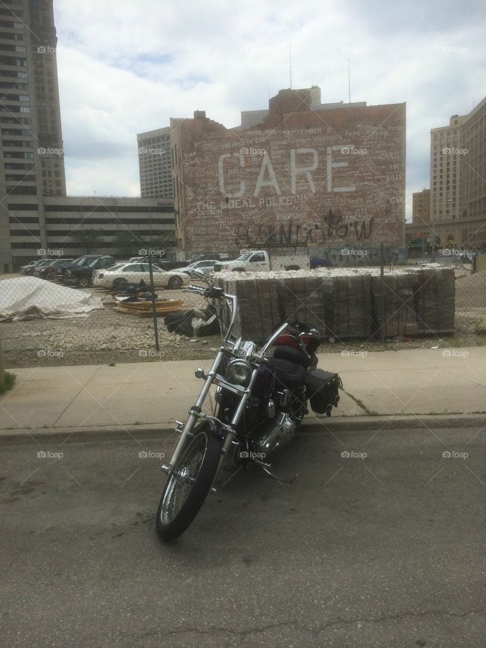 Motorcycle downtown Detroit in front of a wall that seemed like it would be there forever
