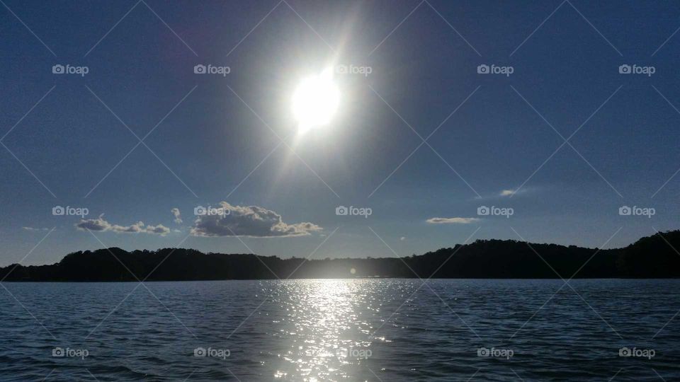 sun over lake