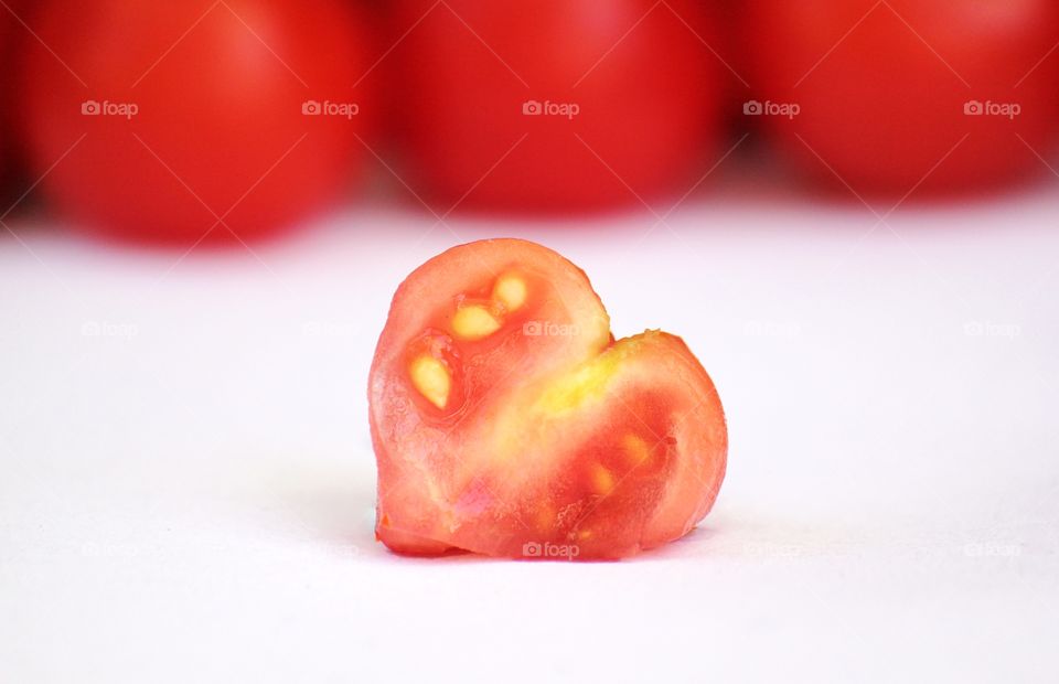 a heart shaped cherry tomato