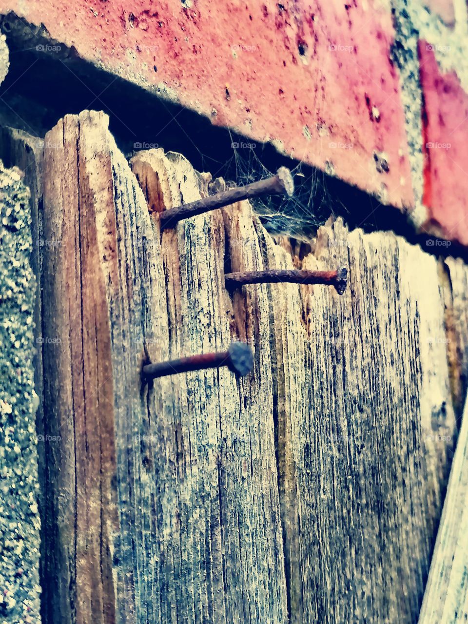 Three nails in the door